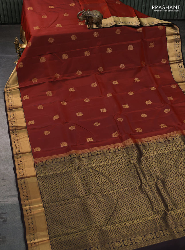 Kanchipuram silk saree rustic orange and coffee brown with annam zari woven buttas and zari woven border