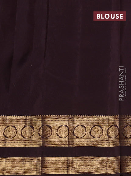 Kanchipuram silk saree pastel blue and coffee brown with plain body and rettapet zari woven border
