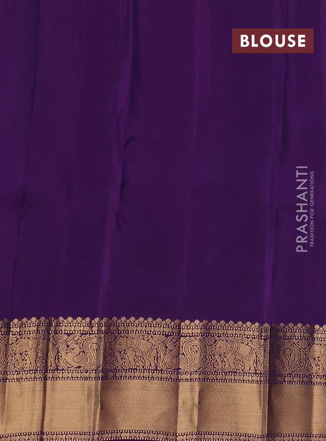 Kanchipuram silk saree peacock blue and violet with allover zari weaves & buttas and annam zari woven border