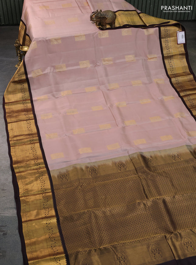 Kanchipuram silk saree pastel peach and coffee brown with zari woven buttas and long zari woven korvai border
