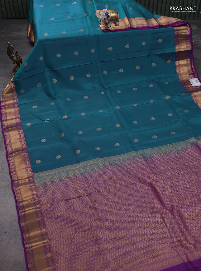 Kanchipuram silk saree peacock blue and purple with zari woven buttas and rettapet zari woven border