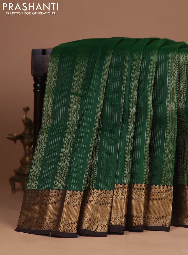 Kanchipuram silk saree bottle green and coffee brown with allover zari weaves and zari woven border