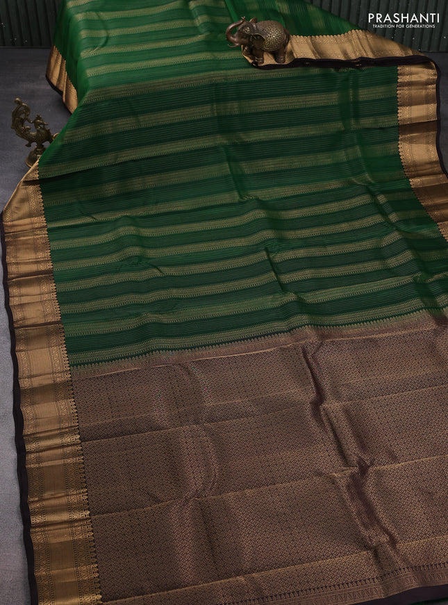 Kanchipuram silk saree bottle green and coffee brown with allover zari weaves and zari woven border
