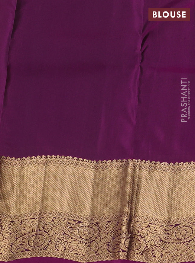 Kanchipuram silk saree green and purple with allover zari woven buttas and zari woven border
