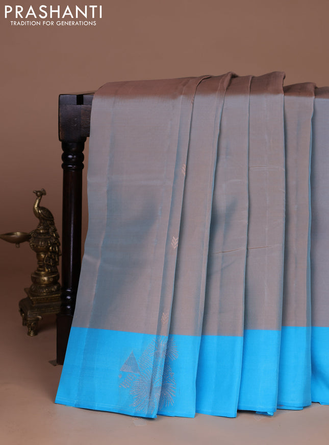 Kanchipuram silk saree beige and teal blue with copper zari woven buttas and copper zari woven butta border