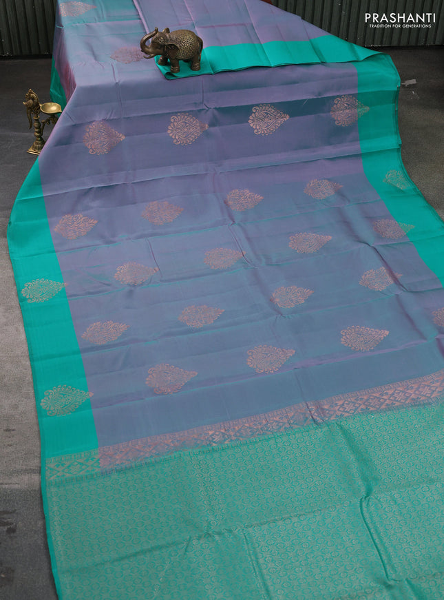 Kanchipuram silk saree dual shade of lavender and teal green with copper zari woven buttas and copper zari woven butta border