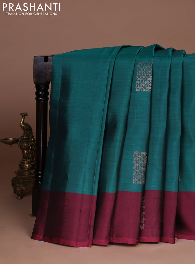 Kanchipuram silk saree peacock green and maroon with copper zari woven buttas and copper zari woven butta border