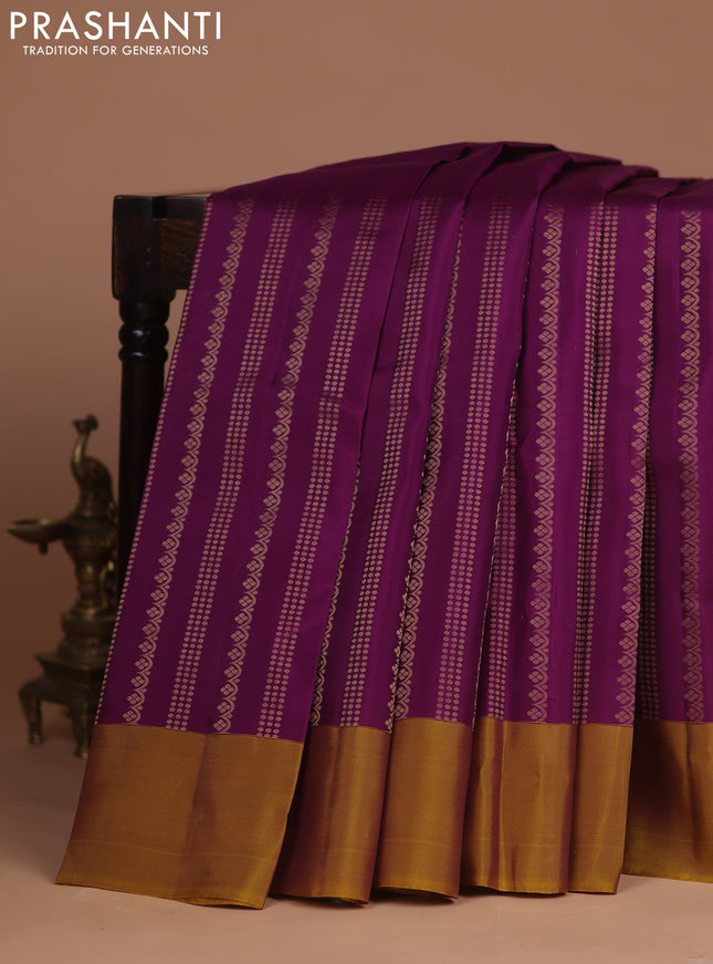Kanchipuram silk saree purple and dark mustard with allover zari weaves and simple border