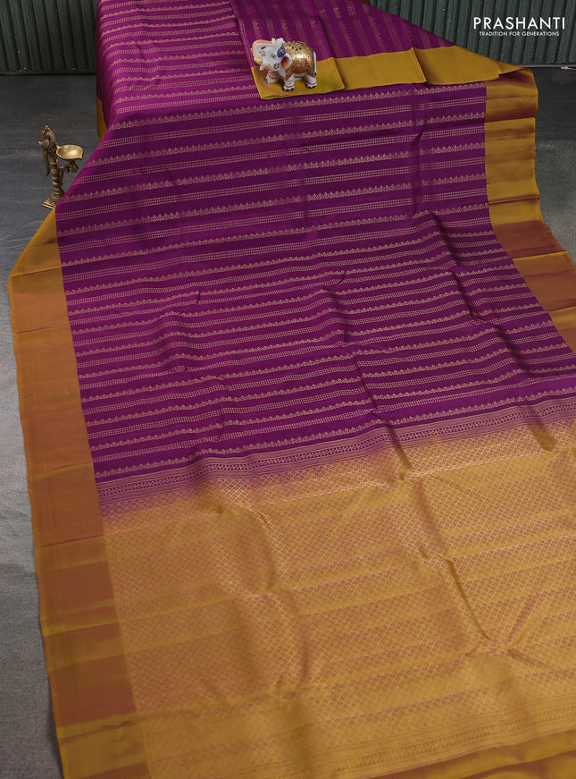 Kanchipuram silk saree purple and dark mustard with allover zari weaves and simple border