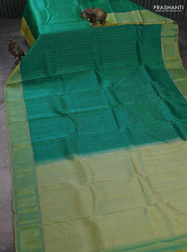 Kanchipuram silk saree teal green and light green with allover zari weaves and rettapet zari woven border