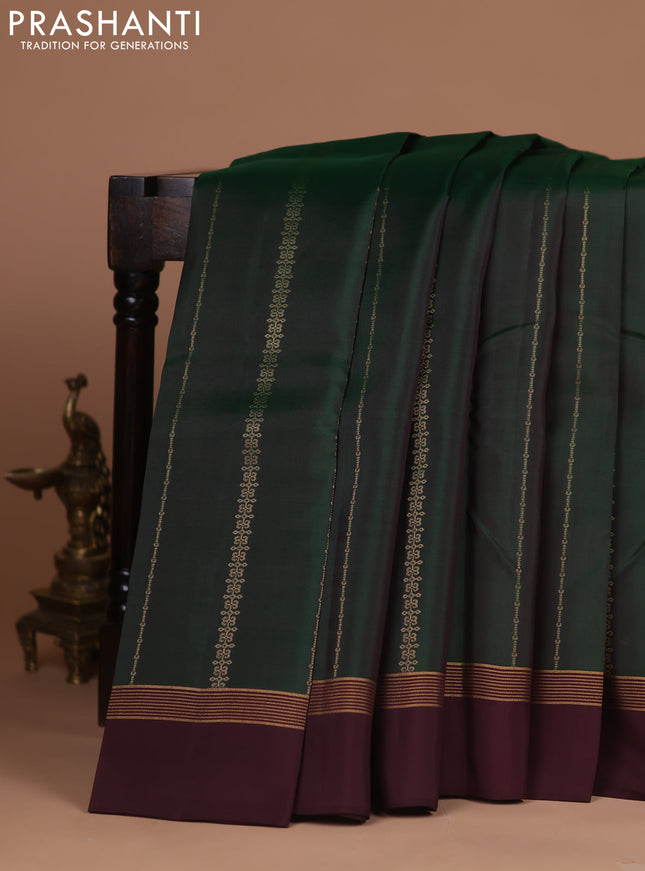 Kanchipuram silk saree bottle green and coffee brown with allover zari weaves and zari woven simple border