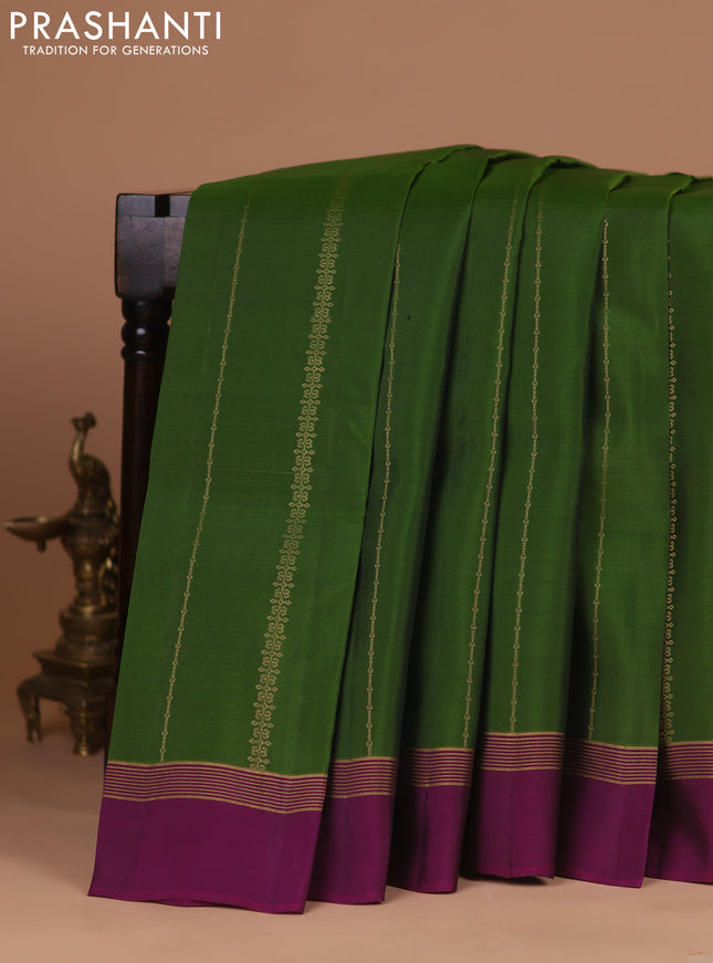 Kanchipuram silk saree mehendi green and purple with allover zari weaves and zari woven simple border