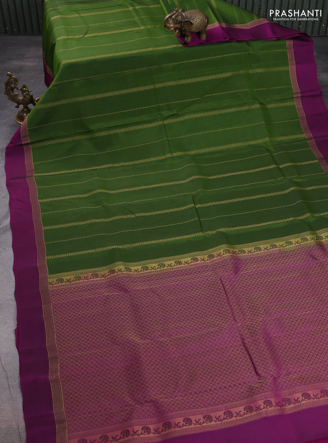 Kanchipuram silk saree mehendi green and purple with allover zari weaves and zari woven simple border