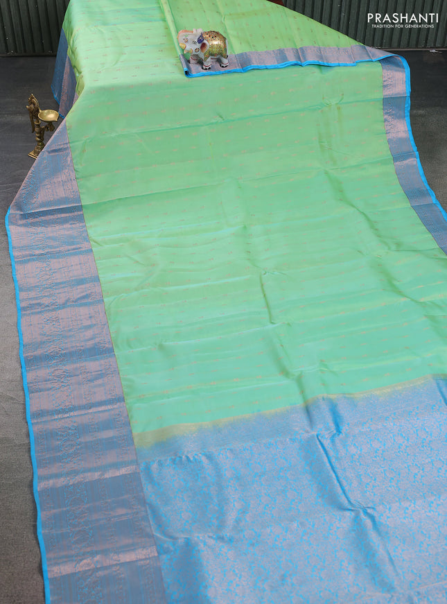 Kanchipuram silk saree teal green and teal blue with copper zari woven buttas and long copper zari woven border