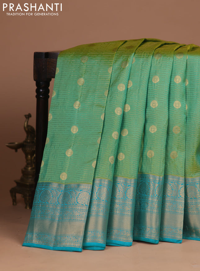Kanchipuram silk saree teal green shade and teal blue with allover zari weaves & buttas and zari woven border