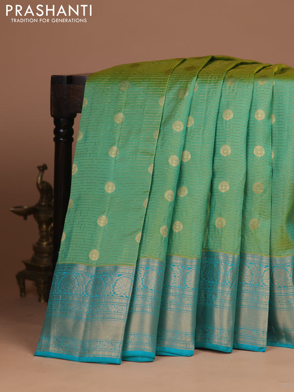 Kanchipuram silk saree teal green shade and teal blue with allover zari weaves & buttas and zari woven border