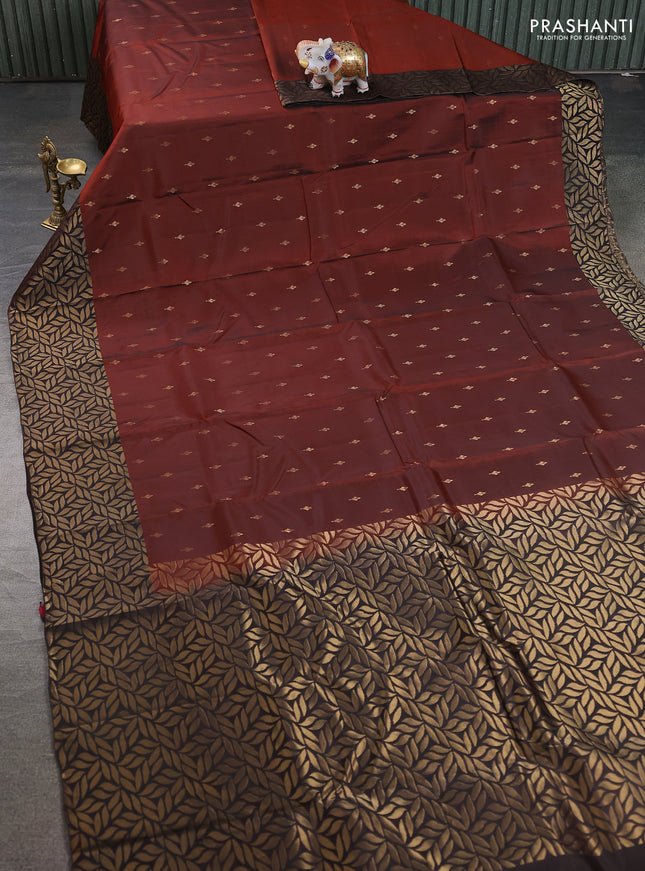 Kanchipuram silk saree rustic orange and coffee brown with allover zari woven buttas and zari woven border