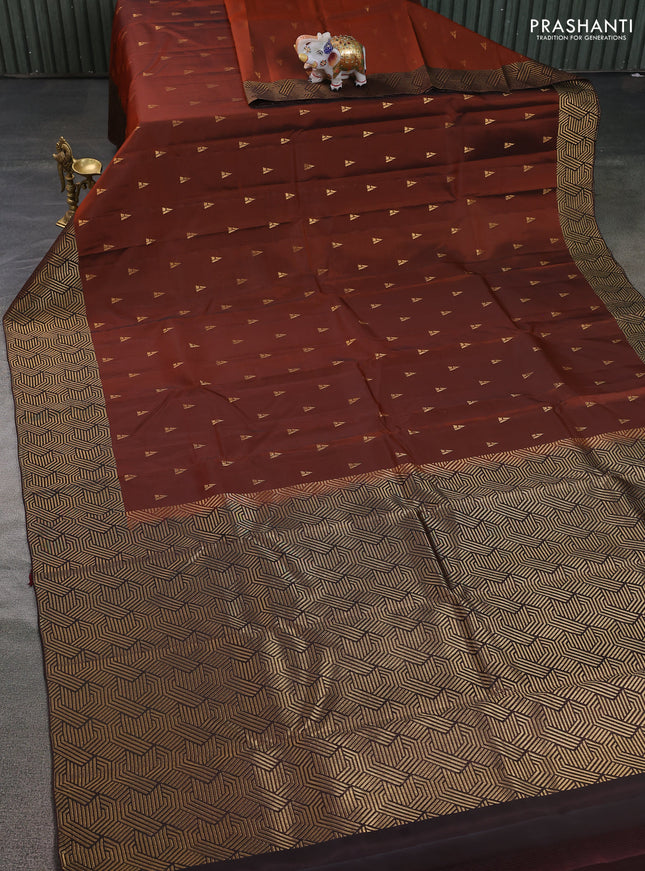 Kanchipuram silk saree rustic orange and coffee brown with zari woven buttas and zari woven korvai border