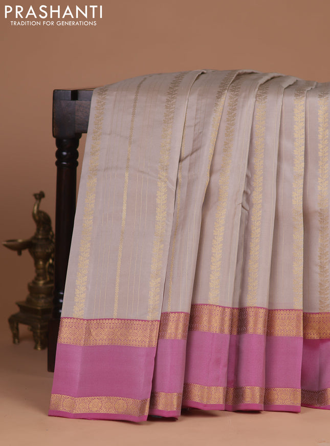 Kanchipuram silk saree beige and pink with allover zari weaves and rettapet zari woven border