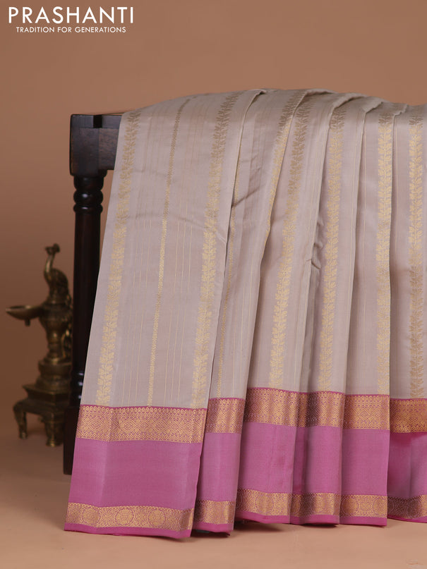 Kanchipuram silk saree beige and pink with allover zari weaves and rettapet zari woven border
