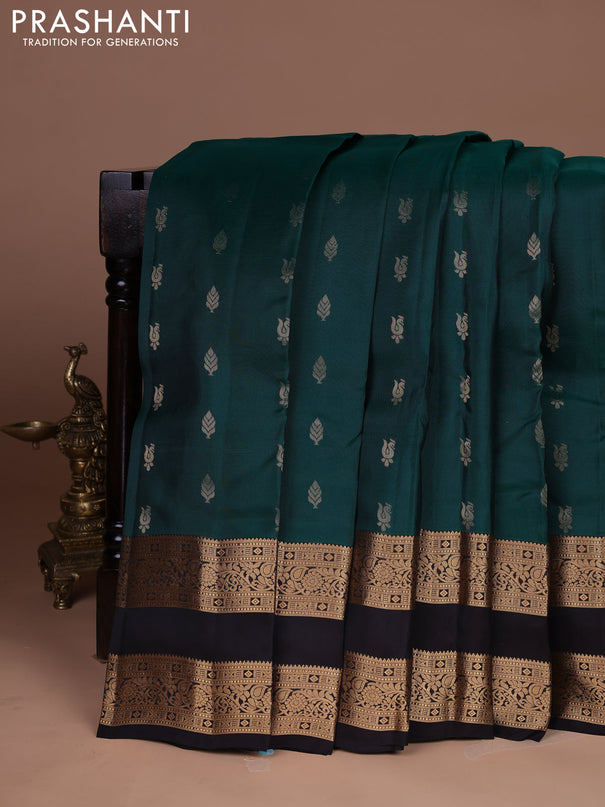 Kanchipuram silk saree bottle green and coffee brown with allover zari woven buttas and rettapet zari woven border