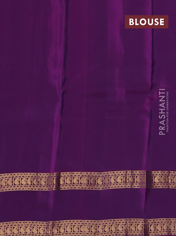 Kanchipuram silk saree peacock blue and purple with allover zari woven buttas and rettapet zari woven korvai border