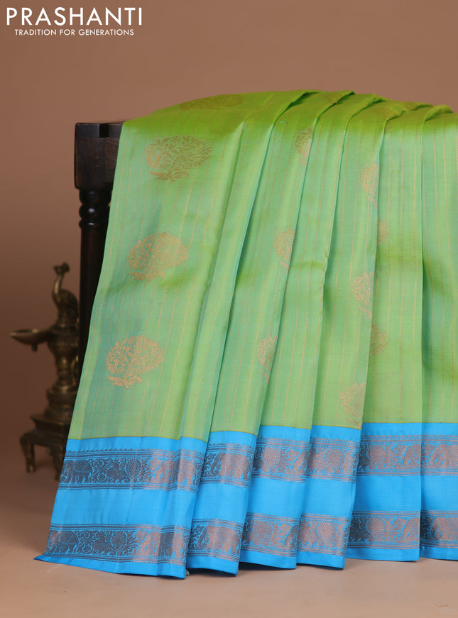 Kanchipuram silk saree dual shade of light green and teal blue with allover zari weaves & zari woven buttas and rettapet zari woven border