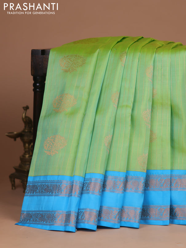 Kanchipuram silk saree dual shade of light green and teal blue with allover zari weaves & zari woven buttas and rettapet zari woven border
