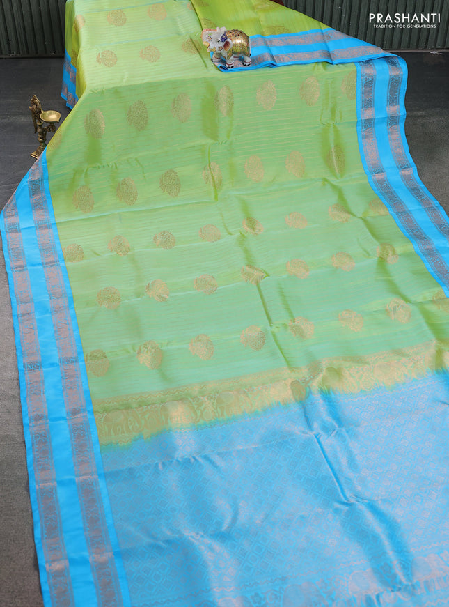Kanchipuram silk saree dual shade of light green and teal blue with allover zari weaves & zari woven buttas and rettapet zari woven border