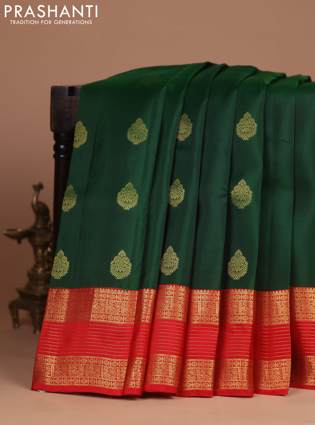 Kanchipuram silk saree bottle green and red with zari woven buttas and rettapet zari woven korvai border