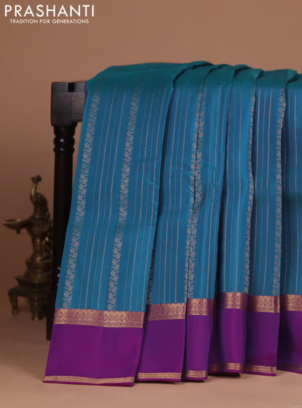 Kanchipuram silk saree peacock blue and purple with allover zari weaves and rettapet zari woven border