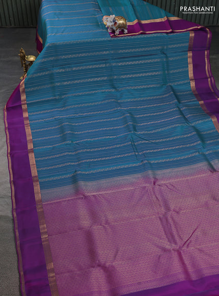 Kanchipuram silk saree peacock blue and purple with allover zari weaves and rettapet zari woven border