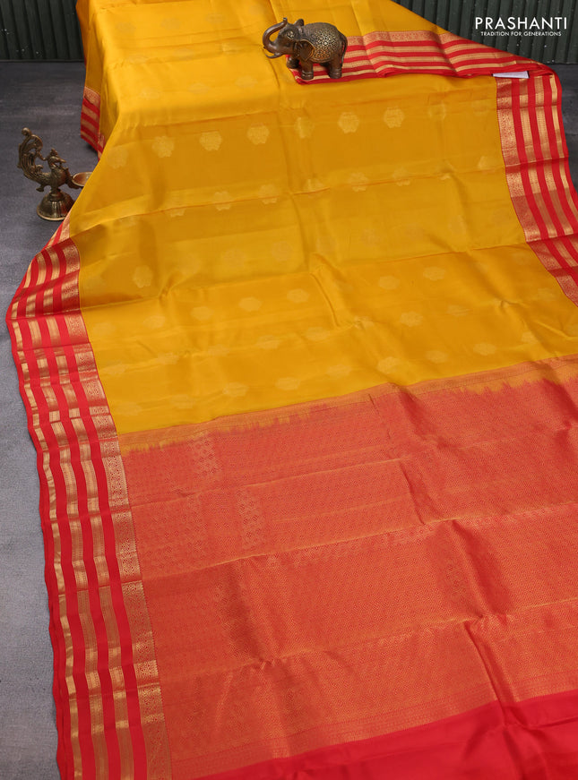 Kanchipuram silk saree yellow and orange with zari woven buttas and zari woven korvai border