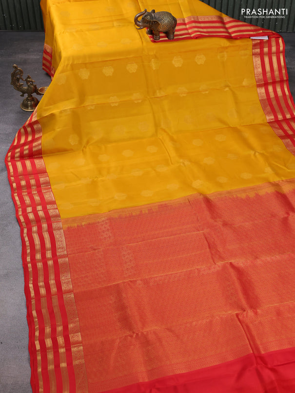 Kanchipuram silk saree yellow and orange with zari woven buttas and zari woven korvai border
