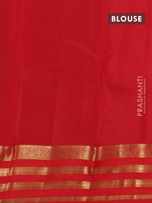 Kanchipuram silk saree black and orange with zari woven buttas and zari woven korvai border