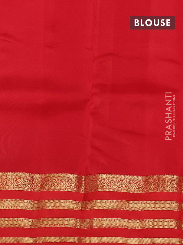 Kanchipuram silk saree pastel green shade and orange with zari woven buttas and zari woven korvai border