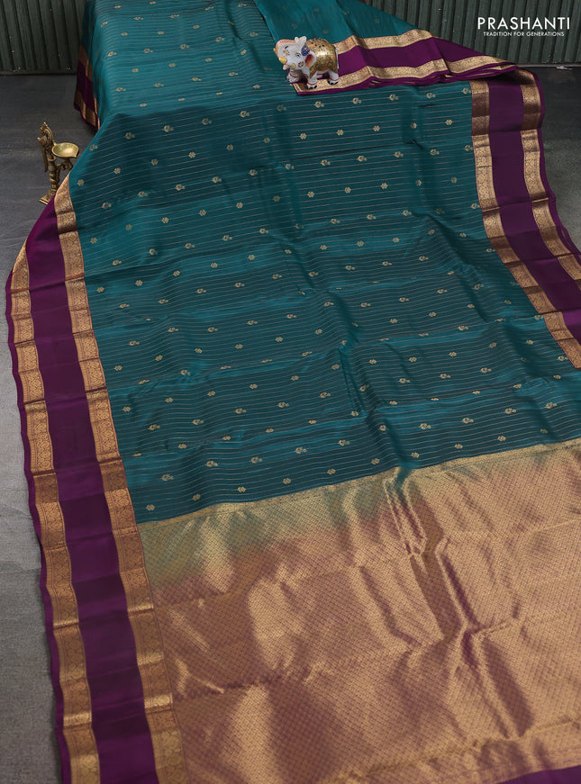 Kanchipuram silk saree peacock green and purple with allover zari weaves & buttas and rettapet zari woven border