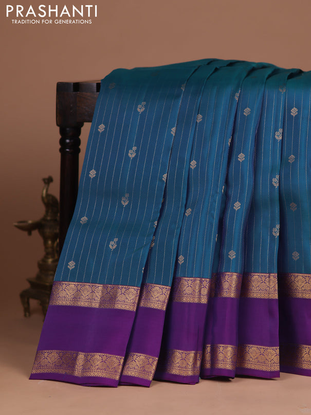 Kanchipuram silk saree dual shade of bluish green and purple with allover zari weaves & buttas and rettapet zari woven border