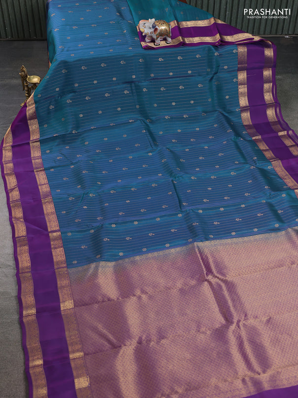 Kanchipuram silk saree dual shade of bluish green and purple with allover zari weaves & buttas and rettapet zari woven border