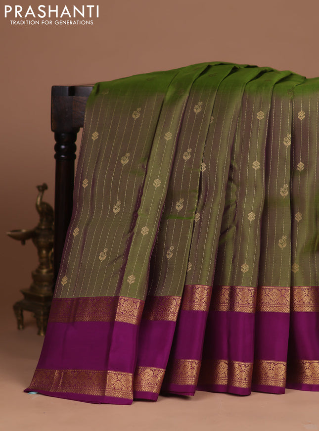 Kanchipuram silk saree dual shade of sap green and purple with allover zari weaves & buttas and rettapet zari woven border