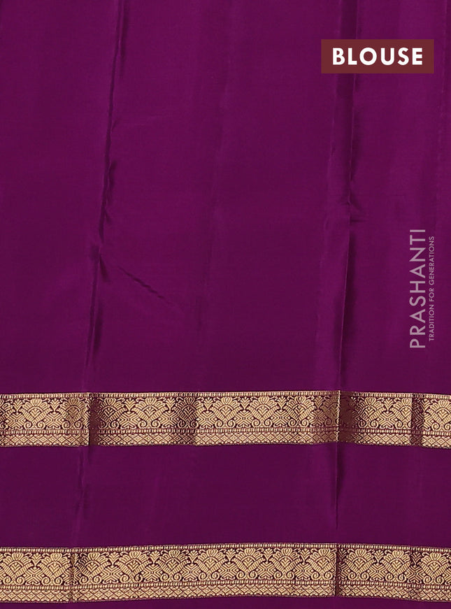 Kanchipuram silk saree dual shade of sap green and purple with allover zari weaves & buttas and rettapet zari woven border