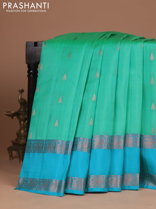 Kanchipuram silk saree teal green and teal blue with allover copper zari weaves & buttas and rettapet copper zari woven border
