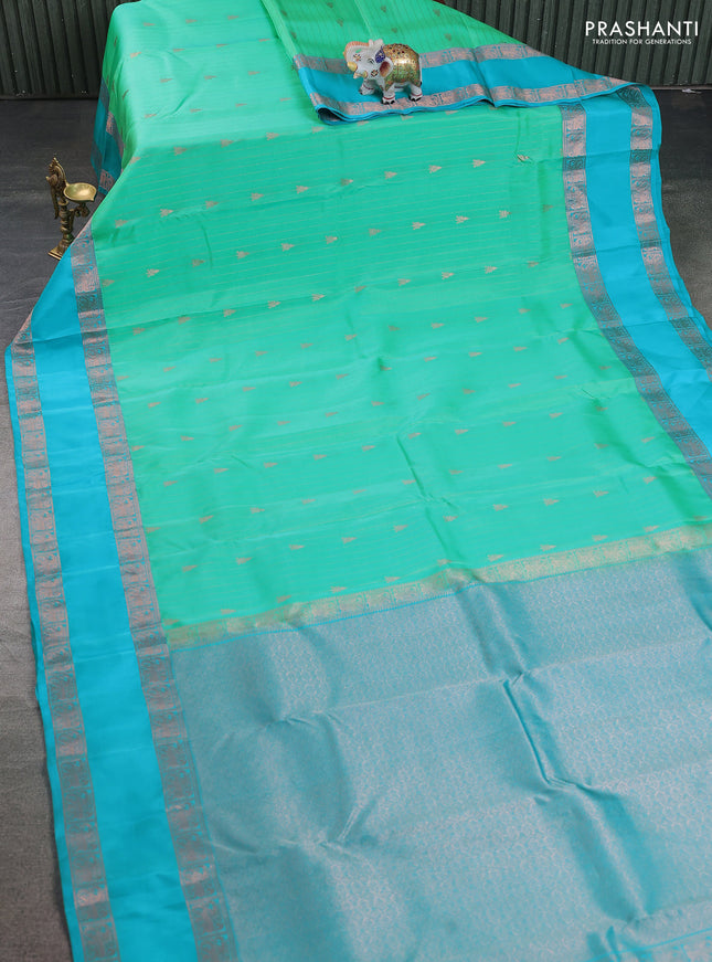 Kanchipuram silk saree teal green and teal blue with allover copper zari weaves & buttas and rettapet copper zari woven border