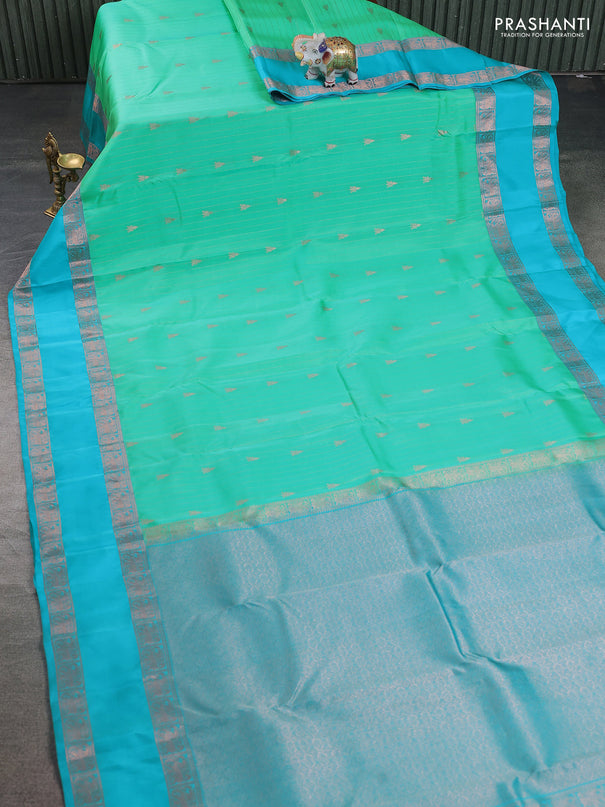 Kanchipuram silk saree teal green and teal blue with allover copper zari weaves & buttas and rettapet copper zari woven border