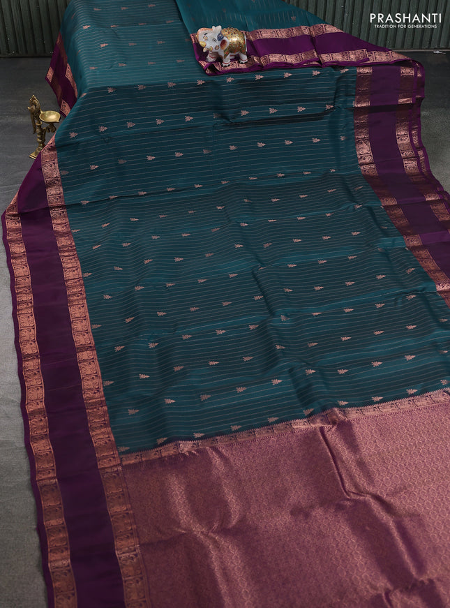 Kanchipuram silk saree peacock green and purple with allover copper zari weaves & buttas and rettapet copper zari woven border