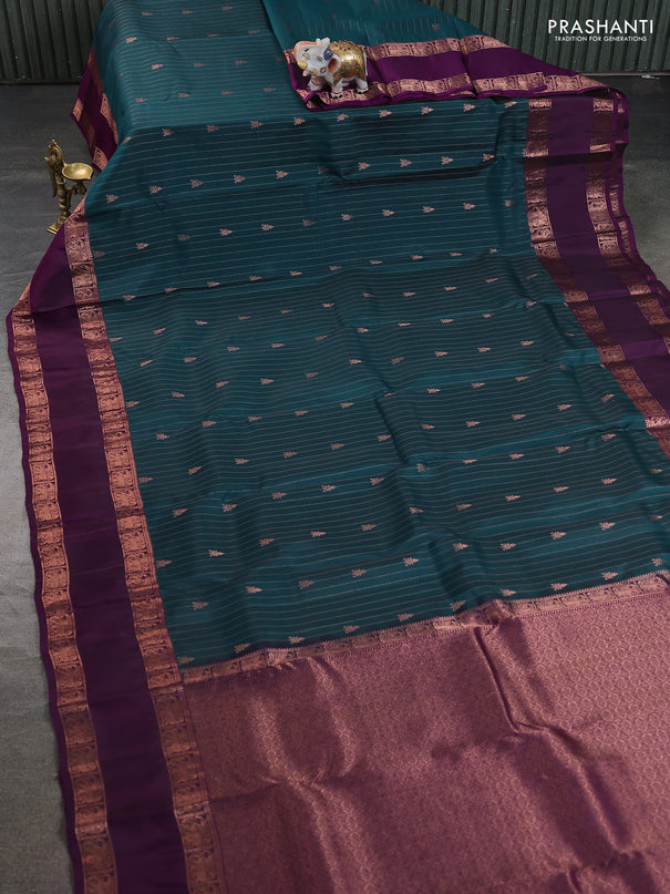 Kanchipuram silk saree peacock green and purple with allover copper zari weaves & buttas and rettapet copper zari woven border