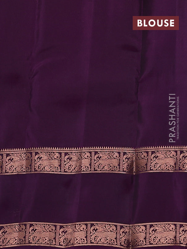 Kanchipuram silk saree peacock green and purple with allover copper zari weaves & buttas and rettapet copper zari woven border