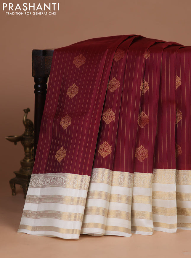 Kanchipuram silk saree maroon and cream with allover zari weaves & buttas and zari woven korvai border