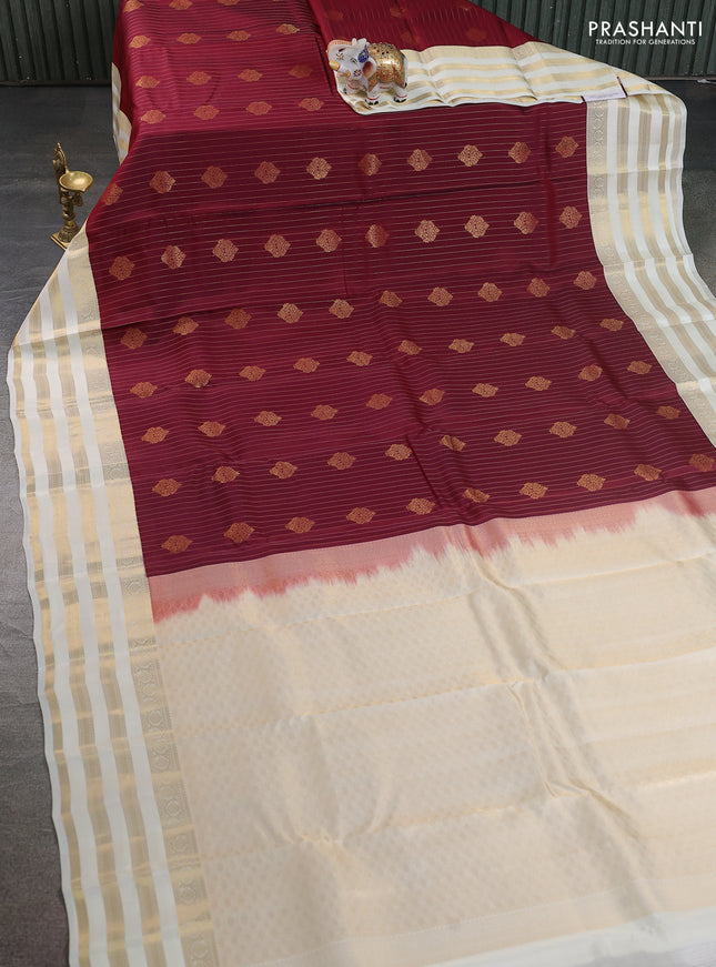 Kanchipuram silk saree maroon and cream with allover zari weaves & buttas and zari woven korvai border
