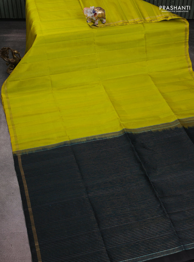 Pure soft silk saree lime green and black with allover jute finish and small zari woven border